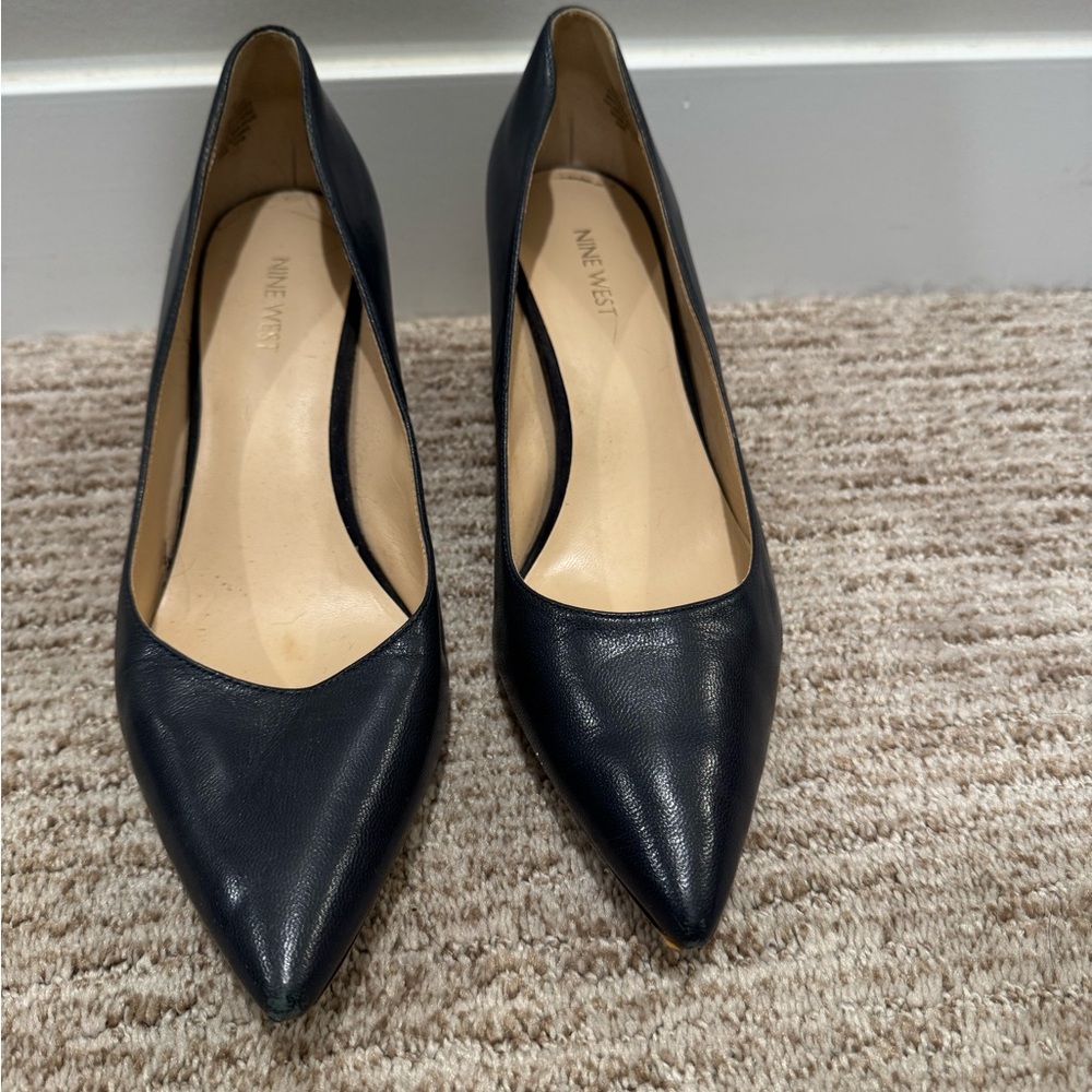 Nine West navy blue heels
Size 10